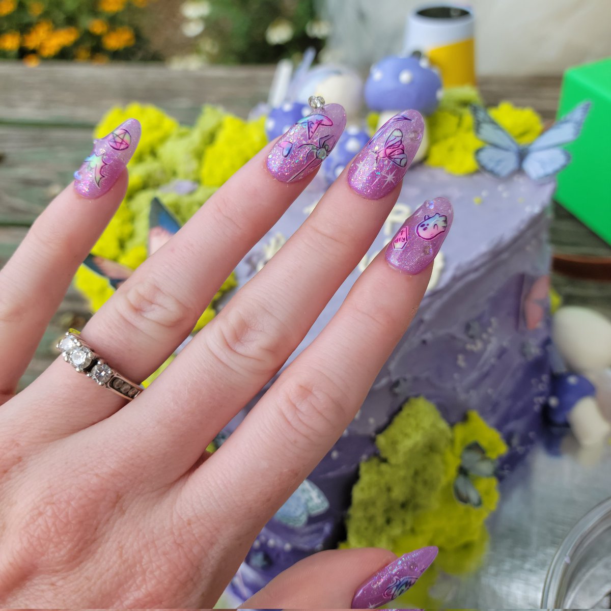 TheBrandyA's tweet photo. My birthday was very purple this year 💜🧚‍♀️🦋 https://t.co/7dMJTchrlo