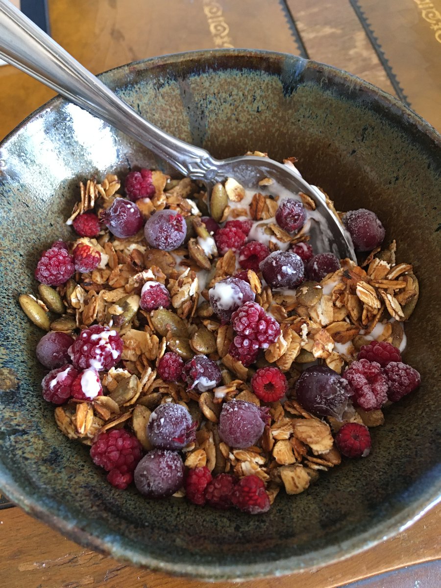 made yungkombucha-style cast iron granola, with lemon elderflower yogurt, serviceberries and wineberries from my freezer stash