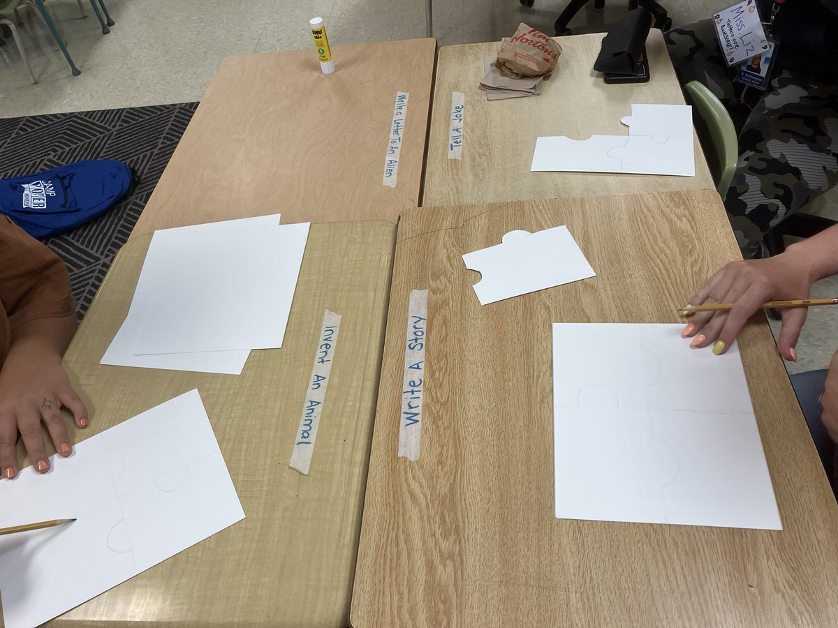 Then they wrote open ended writing ideas on the group of desks to provide choice in writing, allow for exploration of different forms, and allow for targeted written instruction.