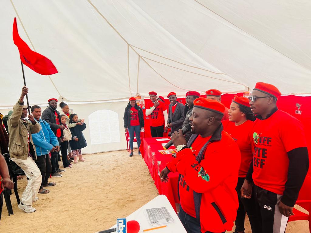 eff_namibia's tweet photo. SWAKOPMUND IS RED | Official Launch of the People's Manifesto for Swakopmund by-elections.
Swakopmund residents, vote for Rodger Dausab to be your servant Councilor of SWAKOPMUND Constituency on August 12, 2022.
#VoteNEFF
#VoteRodger4Swakop
#FreeAMUSHEandDEE https://t.co/16djXcfhFx