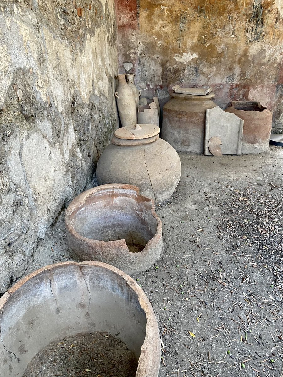 pompei79's tweet photo. These are the empty amphora used for transporting the garum but in the front of the shop there are large vessels that still contain the dried remains of garum: a fermented fish sauce used for flavouring in cooking much like soy sauce. https://t.co/v7HcQEnleM