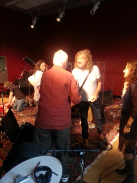 My favorite John Aielli memories are as a listener. But I remember in 2013 when Patty Griffin + Robert Plant played <a href="/KUTX/">KUTX 98.9</a>. Robert asked to meet JOHN! John came in + gently tugged Plant's hair to see if it was "real" (you can see his hair sticking up in this pic). Classic Aielli♥️