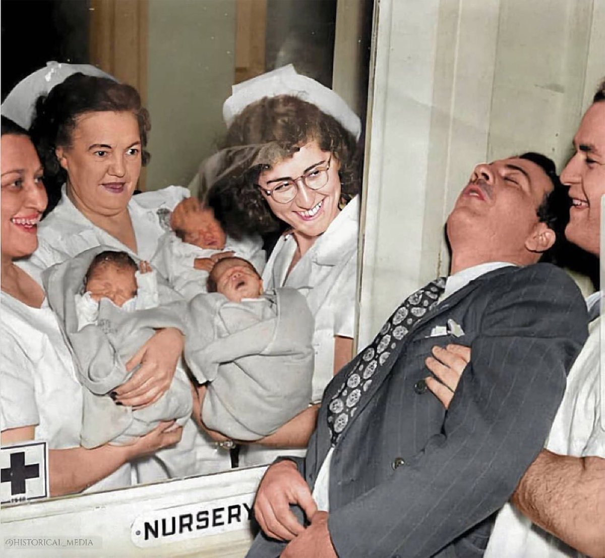 asimighty's tweet photo. #Father faints when he meets his #triplet #babies for the first time in 1946. This was before #ultrasound was invented. https://t.co/hL8UHjd4Uu