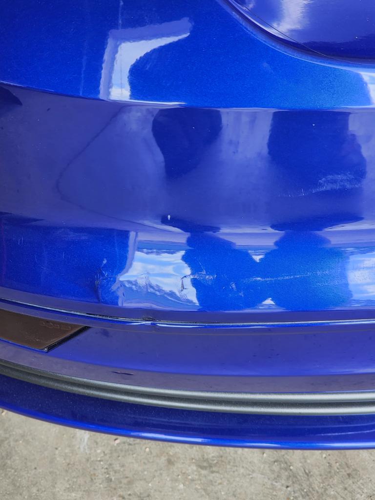 UnfocusedTech's tweet photo. @JayzTwoCents Backed my car into the wife's car's tire. https://t.co/PQ4q5fkaTM