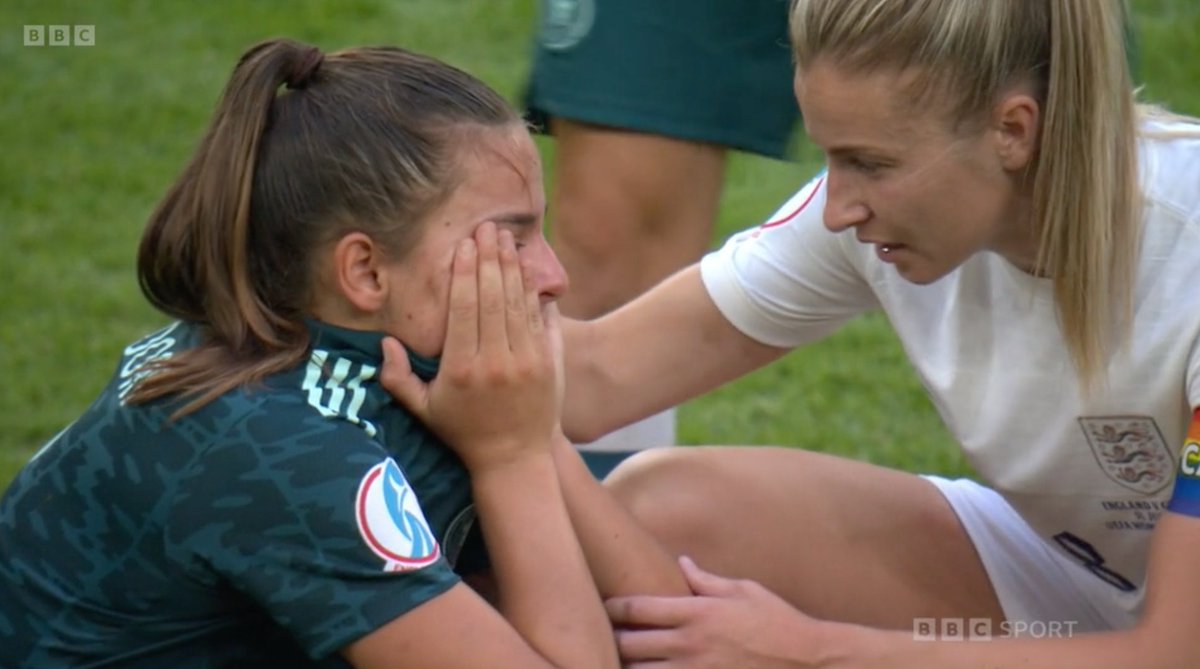 TomJGarry's tweet photo. Amidst so many more iconic images from last night, a little one standing out for me is, seconds after the whistle, as Wembley goes wild, Leah Williamson consoling a distraught Lena Oberdorf. That's your captain right there. Bronze also went to the youngster quickly. Such respect https://t.co/ipJfgVZI5o
