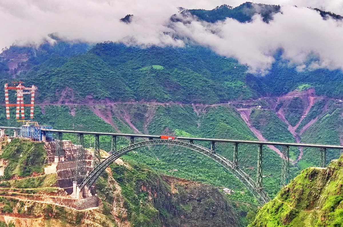 rajat6888's tweet photo. The world's highest #arch #ChenabBridge over the clouds. 
PIC :- @rajat6888
@RailMinIndia 
@AshwiniVaishnaw 
@BJP4India 
@DrJitendraSingh 
@ImRavinderRaina 
@ajay_mlnanda 
@OfficeOfLGJandK 
@RailwayNorthern https://t.co/WkYqxyrfvx