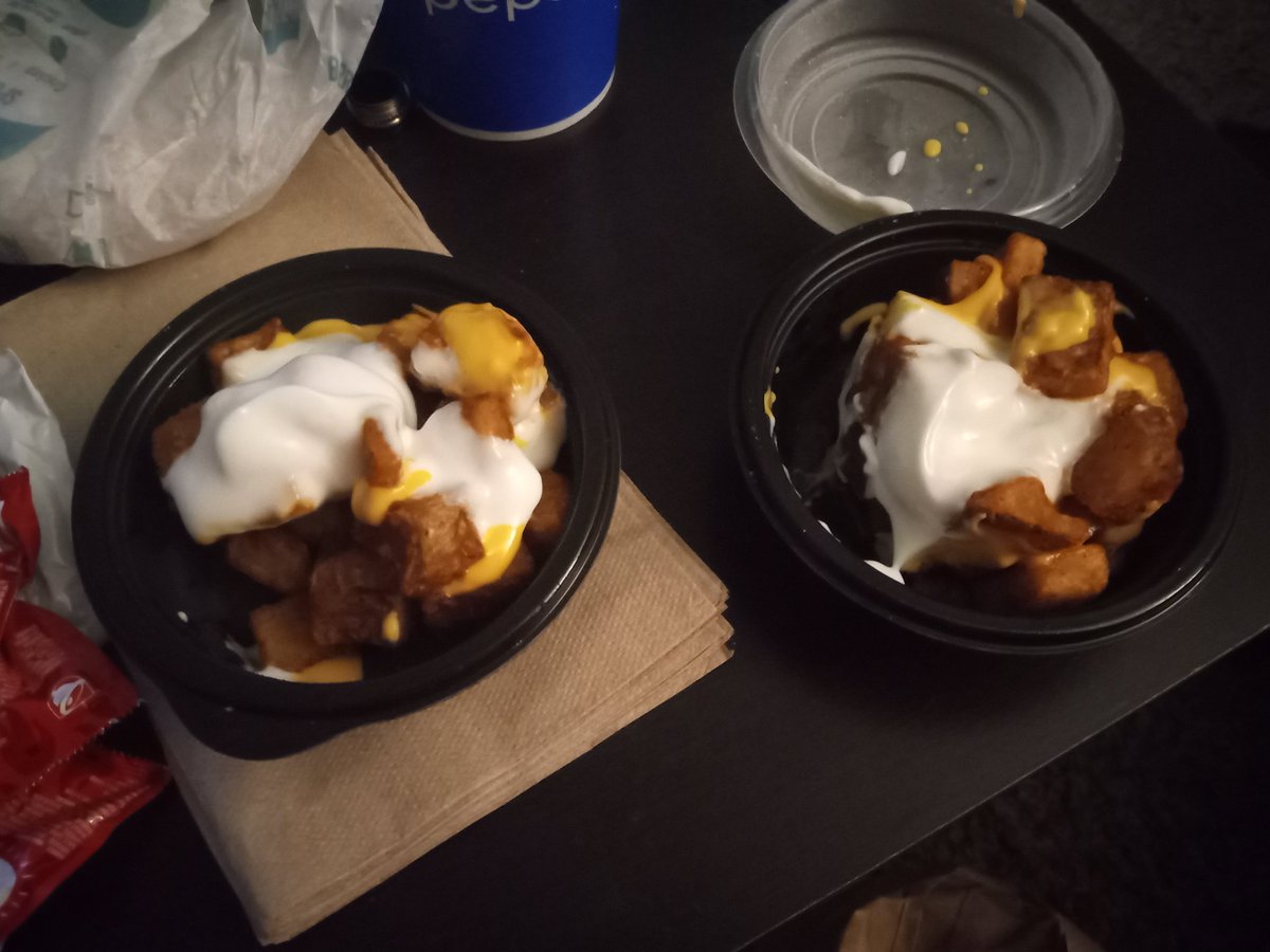TgtAmandaB's tweet photo. WTF @tacobell after putting in an online order for in store pick up and then standing outside for 45 minutes this is what I get? That is literally half an order of cheesy fiesta potatoes. This is absolutely ridiculous! https://t.co/hX2DgN3EpL