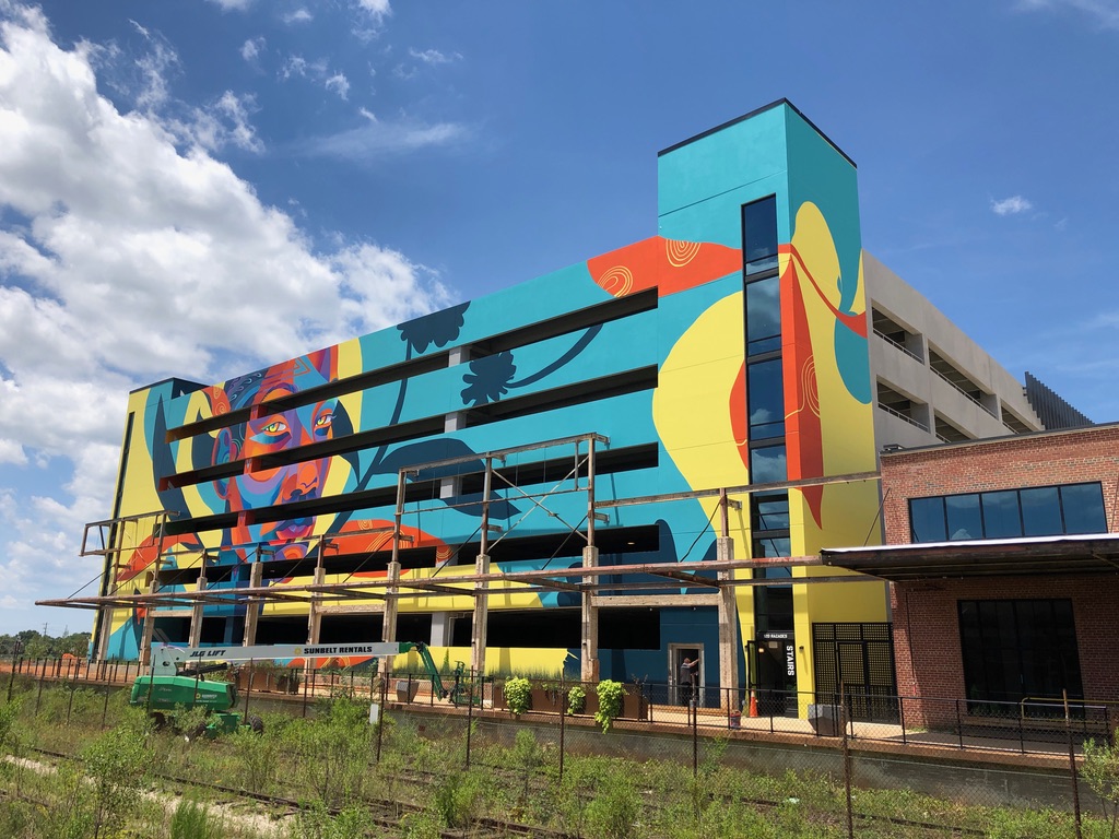 Bumping this monster mural 🧵 in honor of the latest mural at <a href="/campnorthend/">Camp North End</a>, by Neka King and Georgie Nakima (<a href="/gardenofjourney/">GIZ◬</a>)
