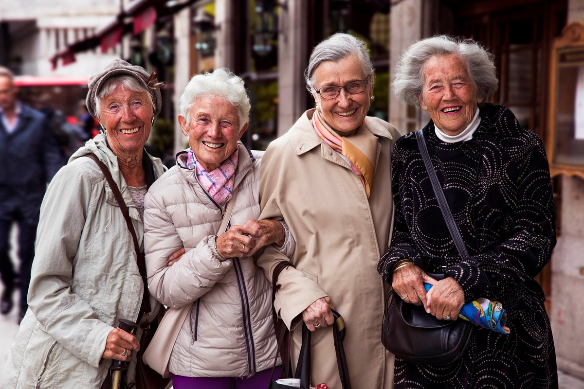 These lovely ladies met in high school and they remained good friends. About 70 years later, I met them on the streets of Oslo, Norway. It was a dark day of May, but they were shinning. “We're out to celebrate old age!” they said. #TheAtlasOfBeauty🔜 an #NFTcollection. #NFT.