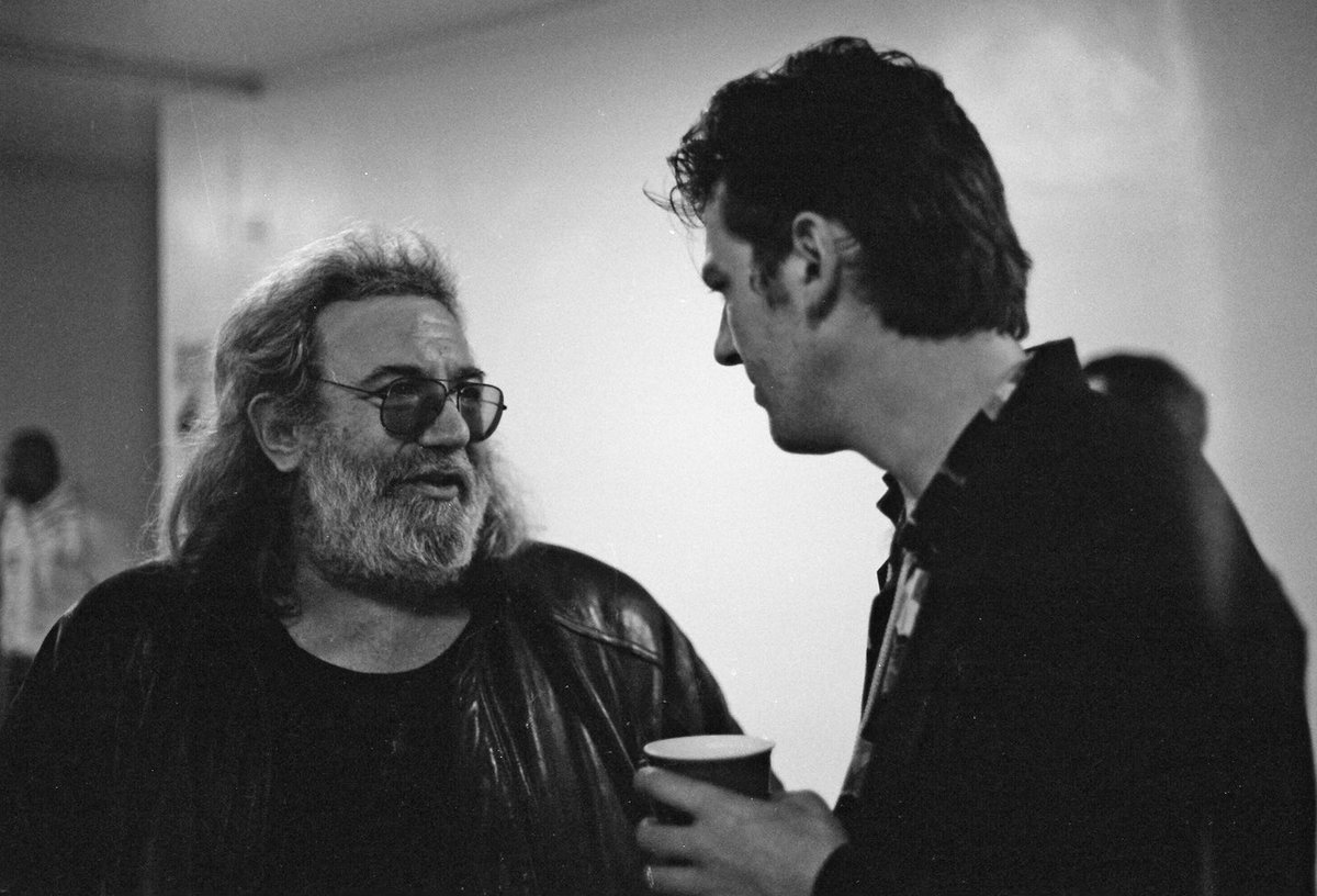 RobynHitchcock's tweet image. Happy Birthday, Captain Trips! Here I am with Jerry Garcia, backstage @remhq in 1989. Jerry was born 80 years ago today, but he seemed apart from time - he just was. And is still, I imagine, somewhere only a dimension away. Bless you, Mr G ♥️🎸♌️
