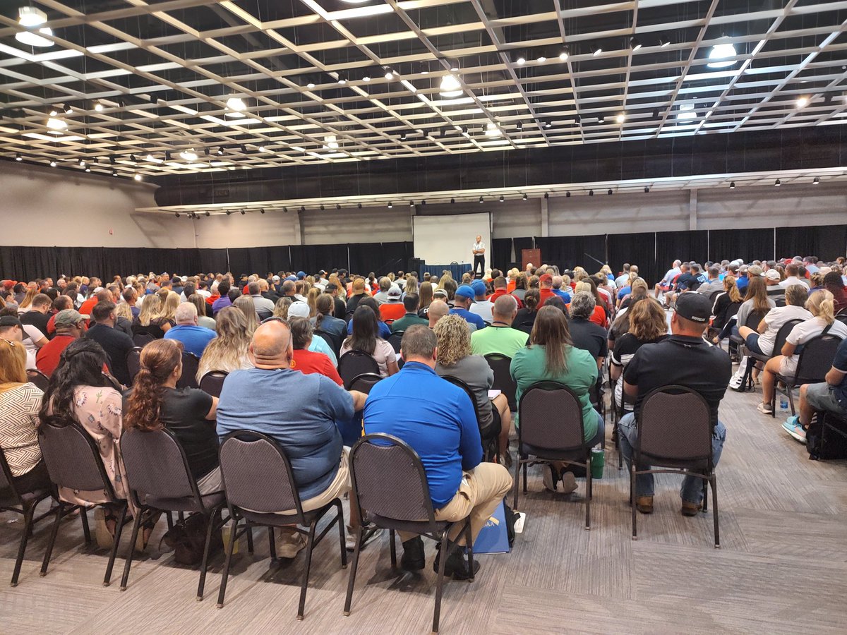 Lon Kruger speaking to packed house at 88th Coaching School.