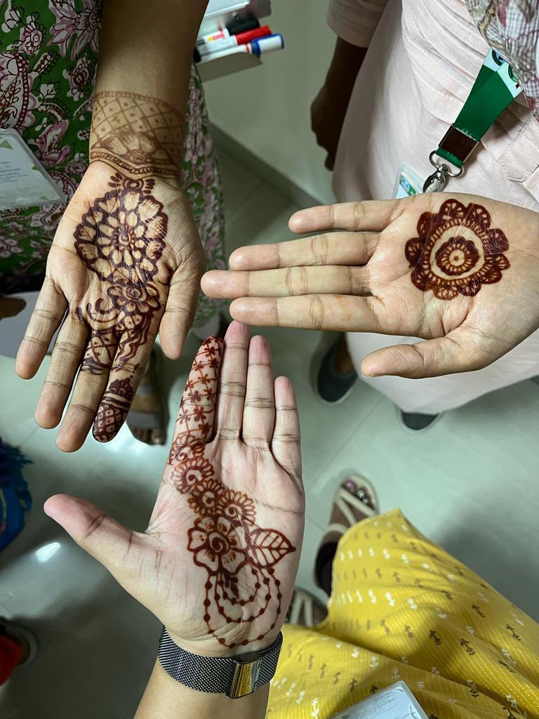 Co-pathologists with after party henna designs 🤎🤎