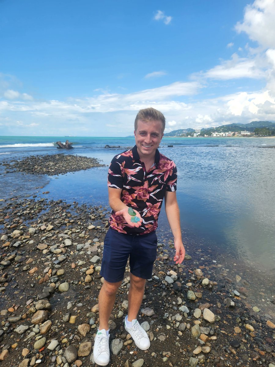 CLSscholarship's tweet photo. #CLSRussian scholar AJ collects sea glass at Batumi beach. "I’m from the Midwest so this is a experience I wouldn't have back home. It is seen as trash here and all the Georgians were surprised I was collecting it." One man's trash is another man's treasure 🐚 ✨ #CLS2022 https://t.co/avelbIqD5x