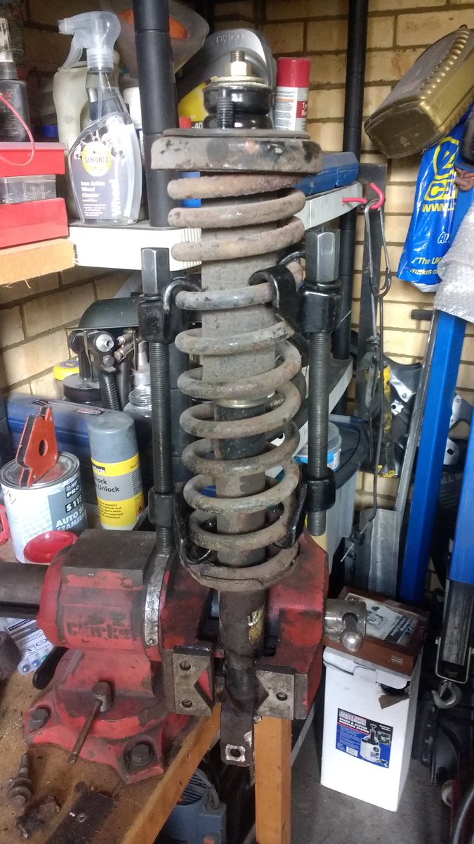 TK42138's tweet photo. De-rusting with citric acid. These suspension and exhaust parts went in at 15:30 and I'll let them soak overnight and update tomorrow. Got the spring off but nearly ran when I heard it creaking. It's a Pavlovian response to using manual spring compressors. #Derusting #Rover https://t.co/YTpJpEeHWy