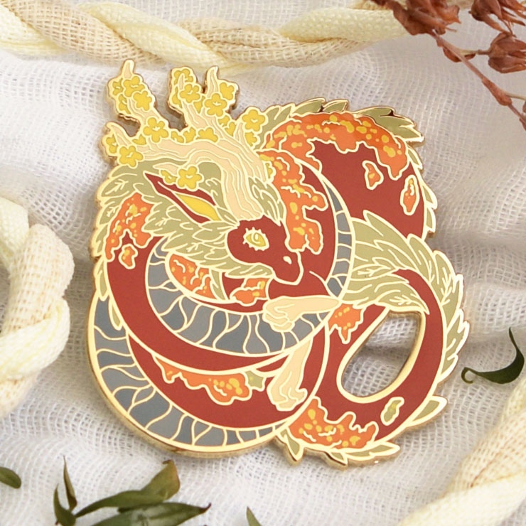 JemmaMYoung's tweet photo. The Forest Dragon from our Dragon pin collection. These beautiful pins are hard enamel with screen printed details. I just love the little flowers in their horns!

https://t.co/NXzGgL6p7S

#dragon #forestdragon #dragonpin #enamelpin #pinlovers #autumndragon https://t.co/QXkB1NIDGH