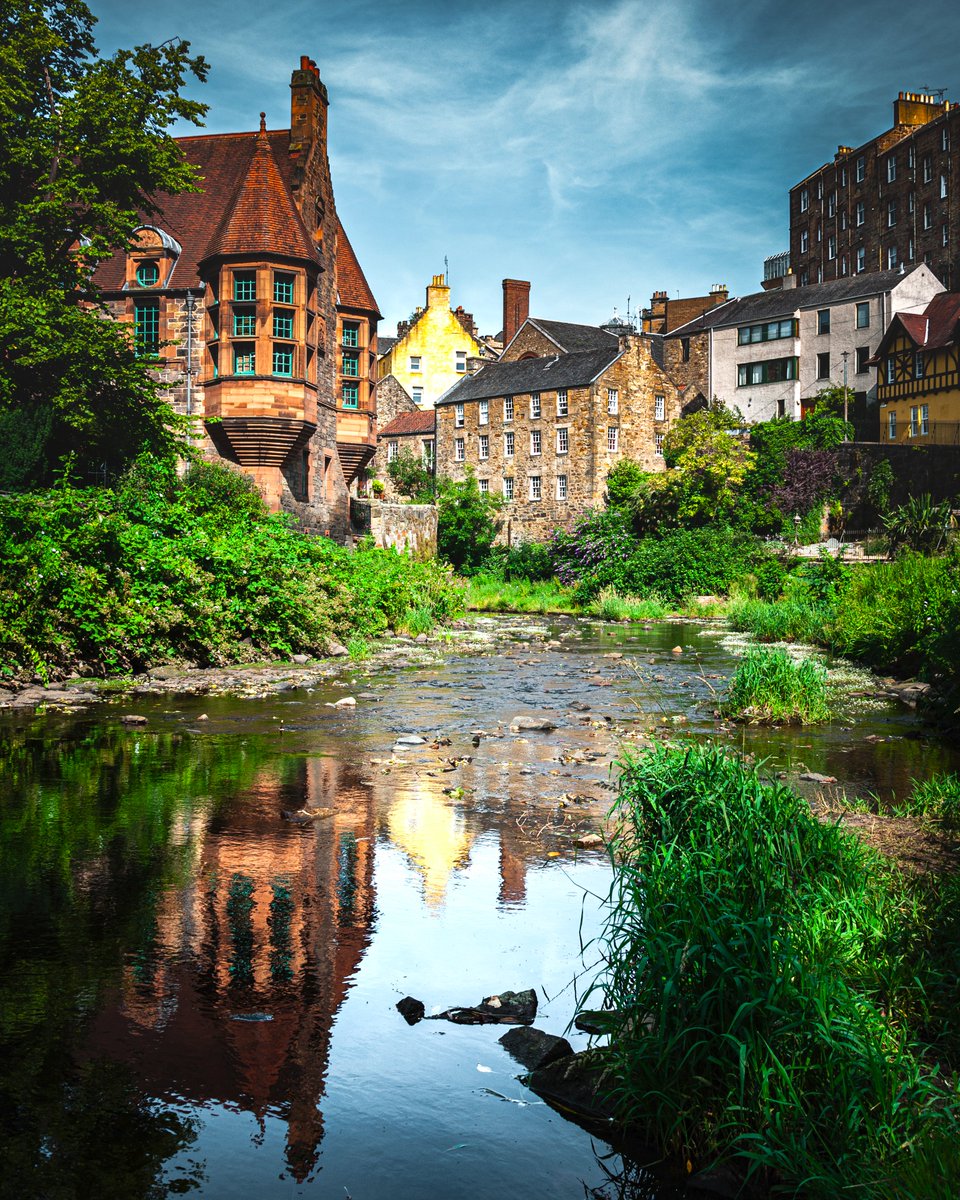 The picturesque buildings in Dean Village Edinburgh are reflected in the Water of Leith. Its only a short walk from the busy city centre  to this popular spot for photographers but it couldnt be more of a contrast #edinburgh #photographylovers #travelphotography