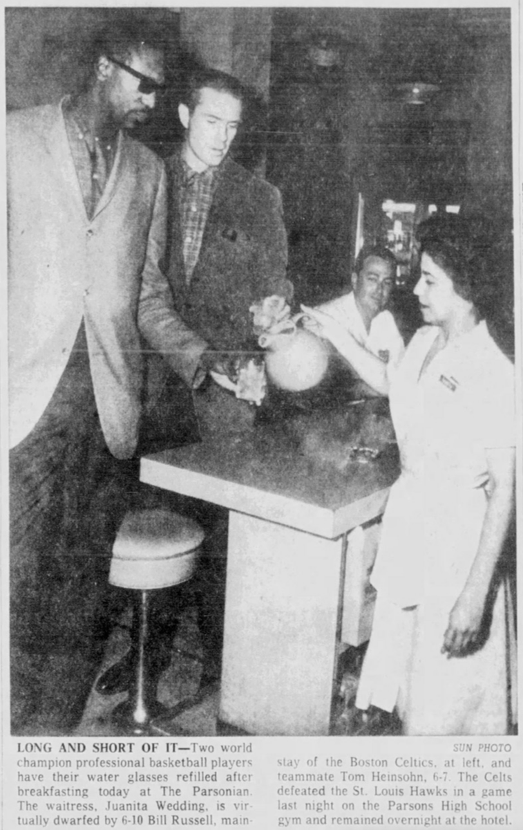 Bill Russell and the Boston Celtics played a preseason game against the St. Louis Hawks at Parsons High School on October 10, 1962.

Here is Russell being served breakfast the next morning at the Parsonian, a building that still stands today.