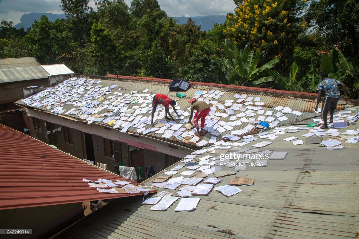 Katumbabadru1's tweet photo. Students dry their books and papers after the mudslide entered their hostel block at Mbale progressive secondary school in Namakwekwe, Uganda on August 1, 2022. https://t.co/0J4eYYfgrm