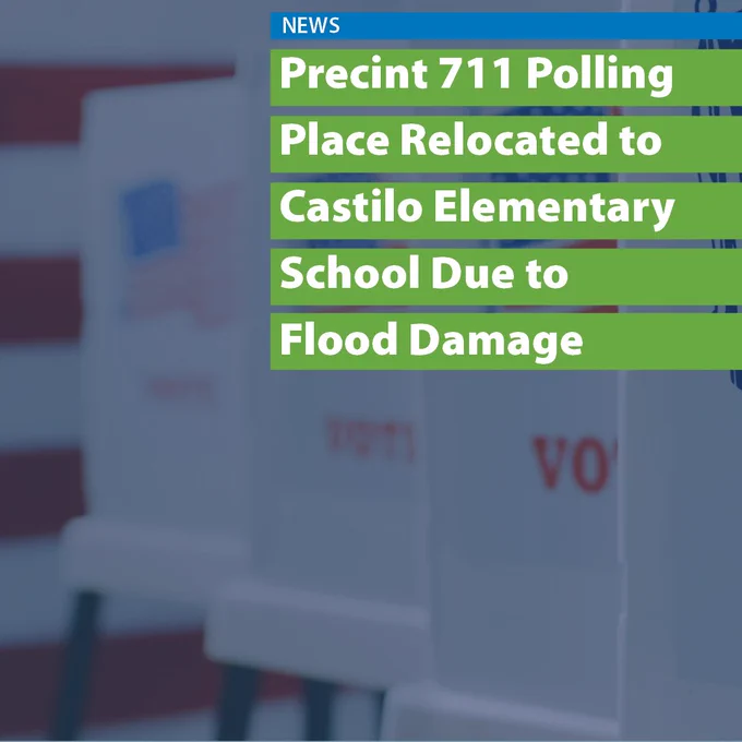 Voting stations in front of an American flag backdrop.
