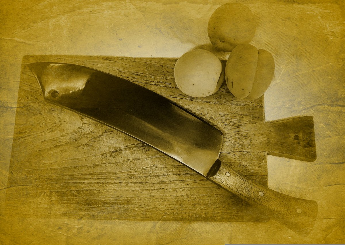 White flesh catches the blue of a summer night. Kitchen steel plays and fruits are given to deities still remembered.

"We give our fruit as our flesh" 1876 #amwriting