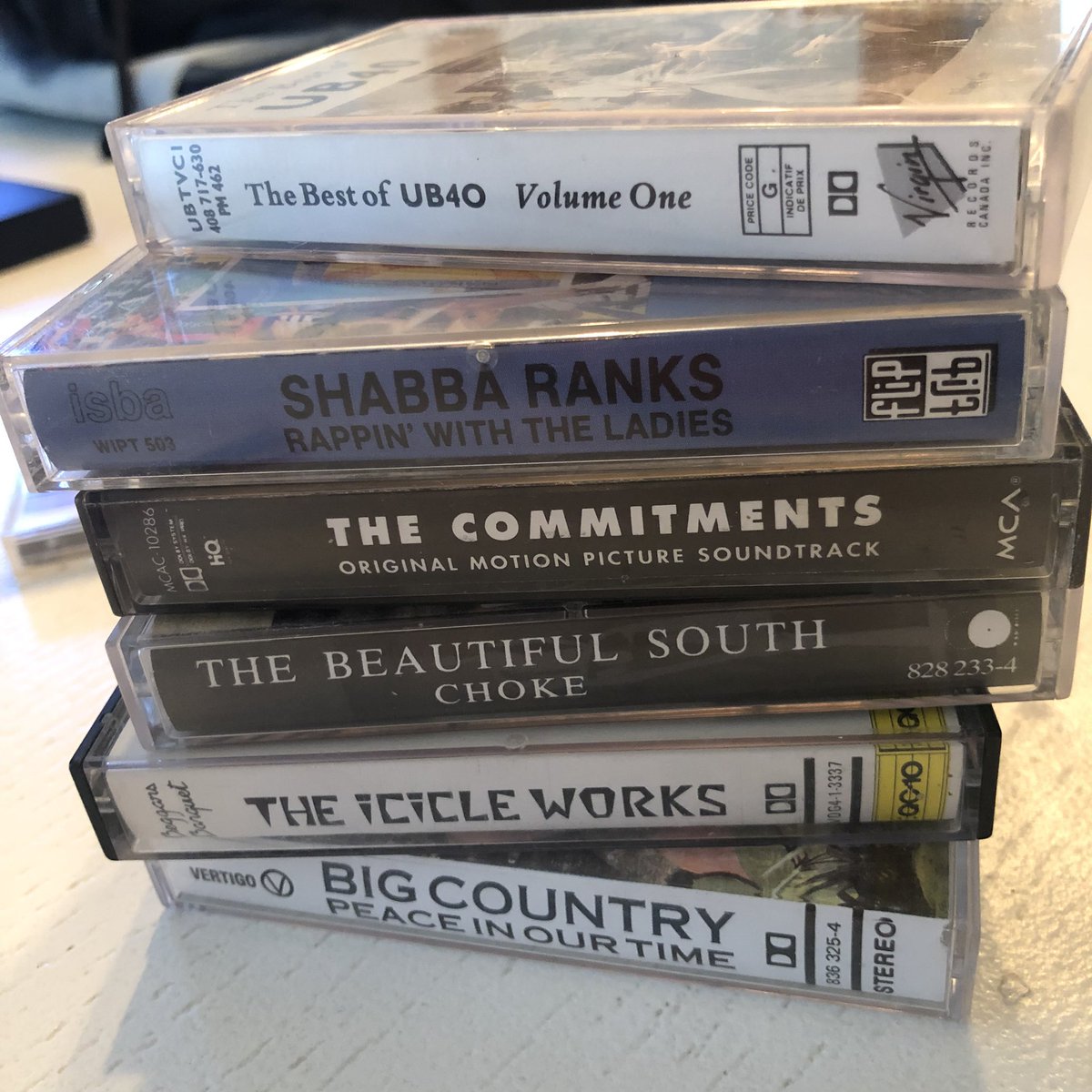 MarcAlexSkully's tweet photo. Can't beat getting a whole bunch of cassettes for 25 cents (!) each at your local record shop - picked up so many old/forgotten favourites #HamOnt #RevolutionRecords #Eighties #Cassettes #UB40 #BigCountry #MaxiPriest #ShabbaRanks #RodStewart #TheBeautifulSouth #TheIcicleWorks https://t.co/ILGDUk5i8a
