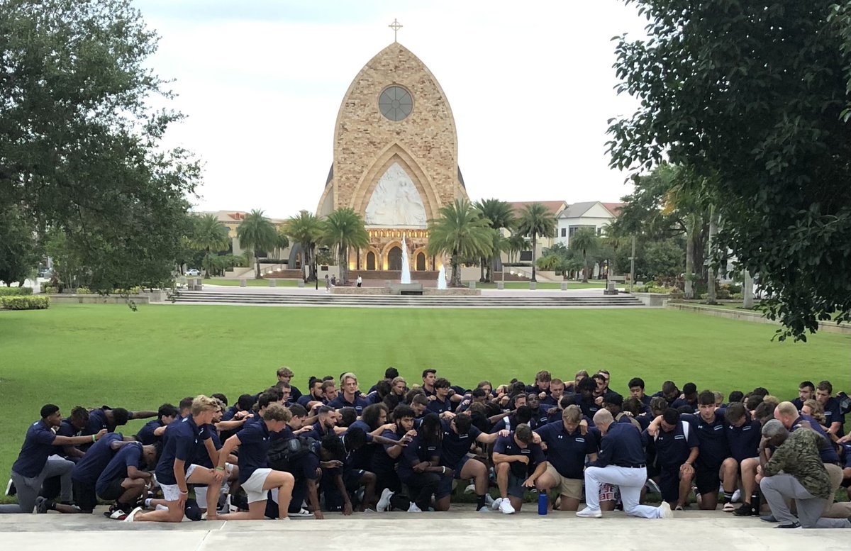 The 2022 Ave Maria Football Team gathers in prayer to begin August Camp. Excited to embark on this journey!
Our Lady of Victory, pray for us.