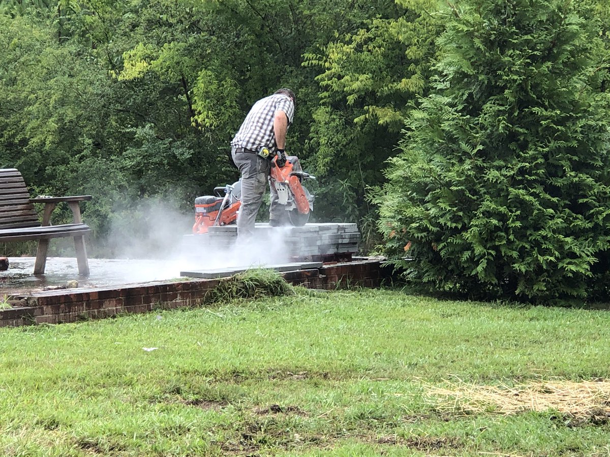 Isaac spent the day in the rain today wrapping up his project with the help of his amazing mentor, Trip Booker.  This included cleaning up the site so he didn’t leave a mess. The patio is finished but he still has 8 benches to restore. Plan is to knock these out at home.