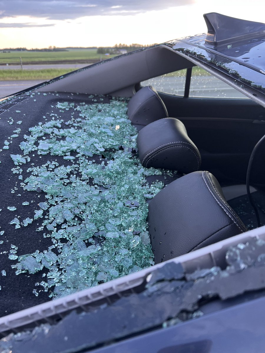 dianaustral's tweet photo. My car got destroyed by hail today. #abstorm https://t.co/MfloL6Osy9