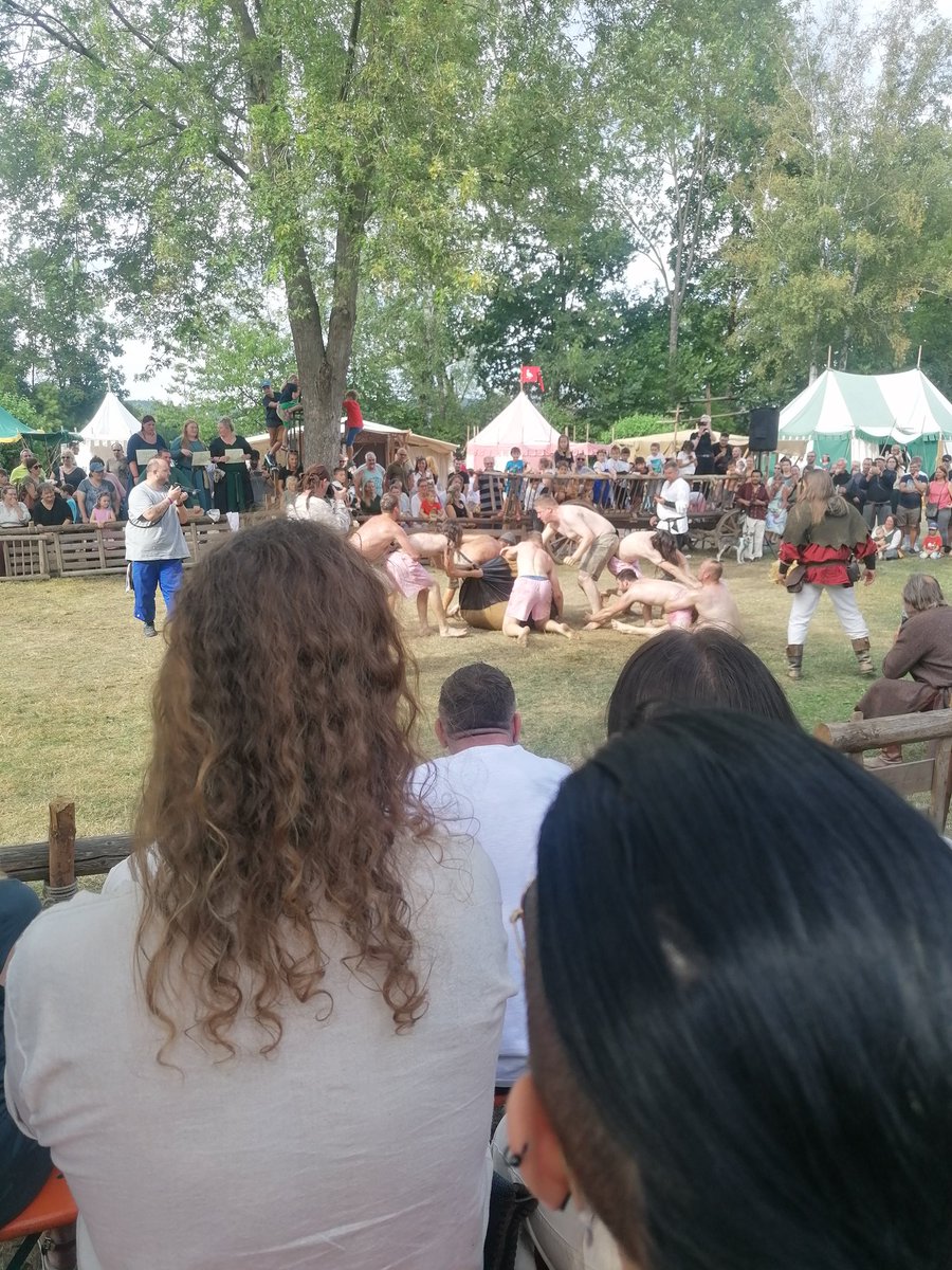 One day after having a conversation about weird sorbian traditions and it couldn't get weirder in living in Bavaria this happened:
Almost naked man covered in butter fighting over a huge leather ball, covered in butter.