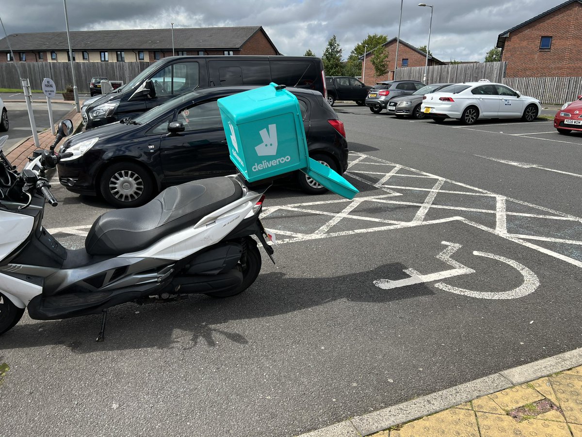 david_mccallum's tweet photo. @Deliveroo nice of your driver to block the disabled bay. Quite tricky to park an accessible van for my child. Also having to cross a car park in a low chair! https://t.co/rB6cuKqtTh