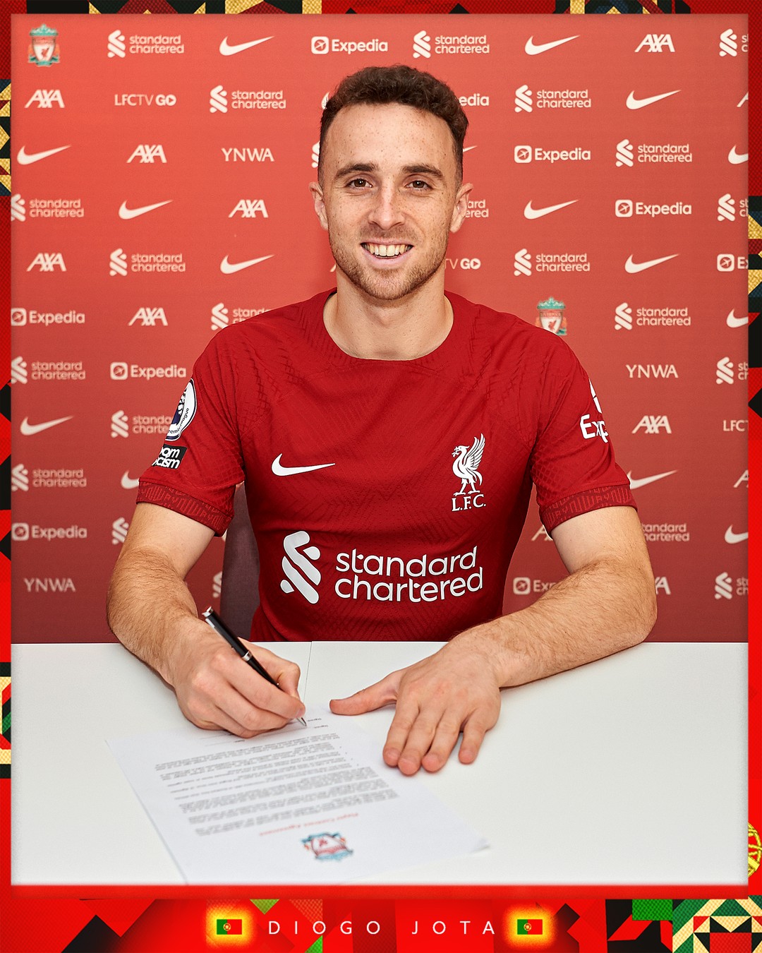 Diogo Jota puts pen to paper on a new long-term contract with the Reds.