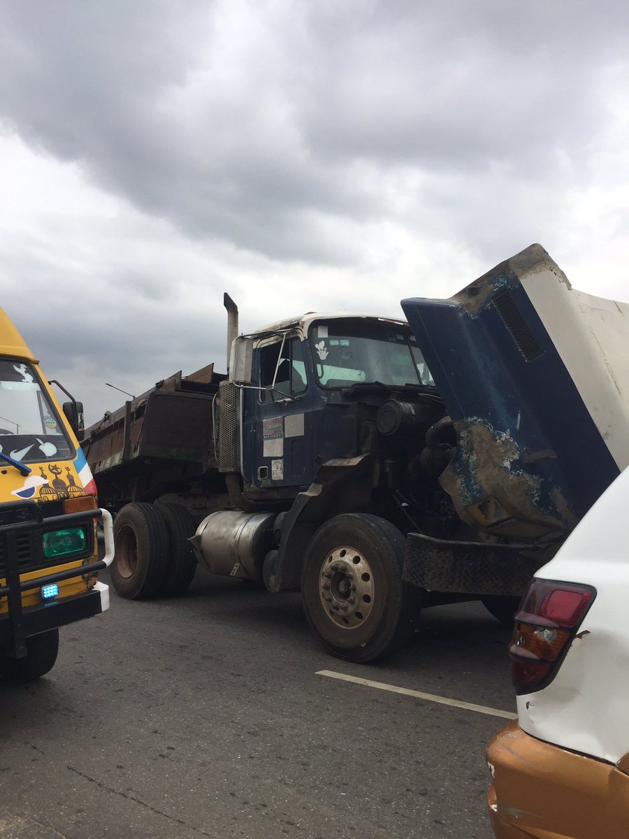 LastmaKola's tweet photo. @lagostraffic961 A broken down truck fully loaded with steel iron having battery problem after con oil filling station inward Cement taking 95% of the road leaving one lane for vehicular movement. Backlog presently at Dopemu Under bridge https://t.co/nfV8RZE1FC