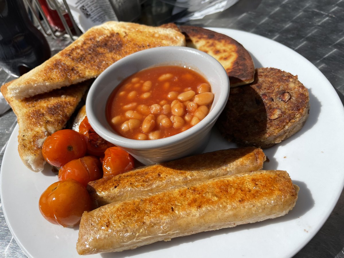 this is the finest full scottish vegan breakfast i have had in edinburgh so far. it's at a place called BBL (breakfast brunch and lunch) (lol). beanz, links, perfectly roasted mushrooms and tomatoes, haggis, sausage square, and potato scone