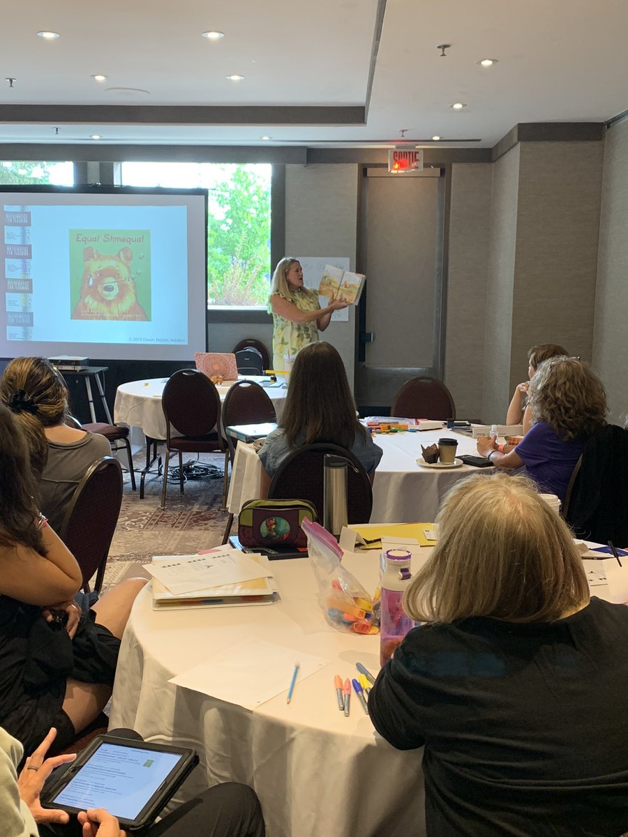Using books to introduce a mathematical concept. Not just for K-2. Look at all these engaged teachers with 5 and a half centuries of teaching experience! #dnamath #lceeqmath