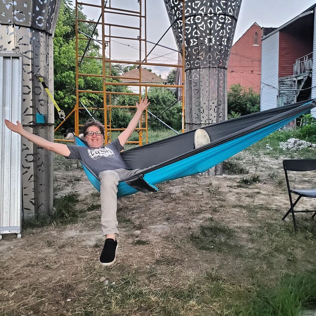 GhanaThinkTank's tweet photo. John Ewing, always innovating. Hammock under the #AmericanRiad on a balmy Summer #Detroit evening after 4 days of toil in the sky. https://t.co/WY6RoABp38 https://t.co/xdib8gZKH4
