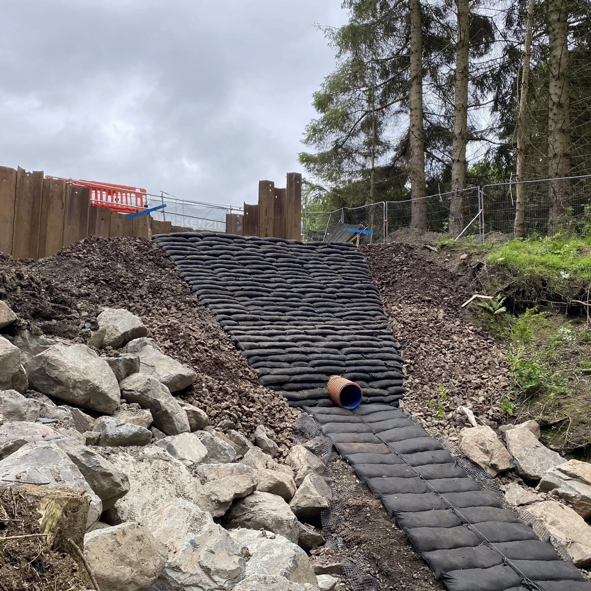 Using #FlexMSE for this headwall and outfall is a great example of the versatility of the system. Not only will this vegetated headwall hide the #infrastructure and keep this area cooler, the outfall cladding will help to prevent channel erosion. Where else can you see Flex MSE?