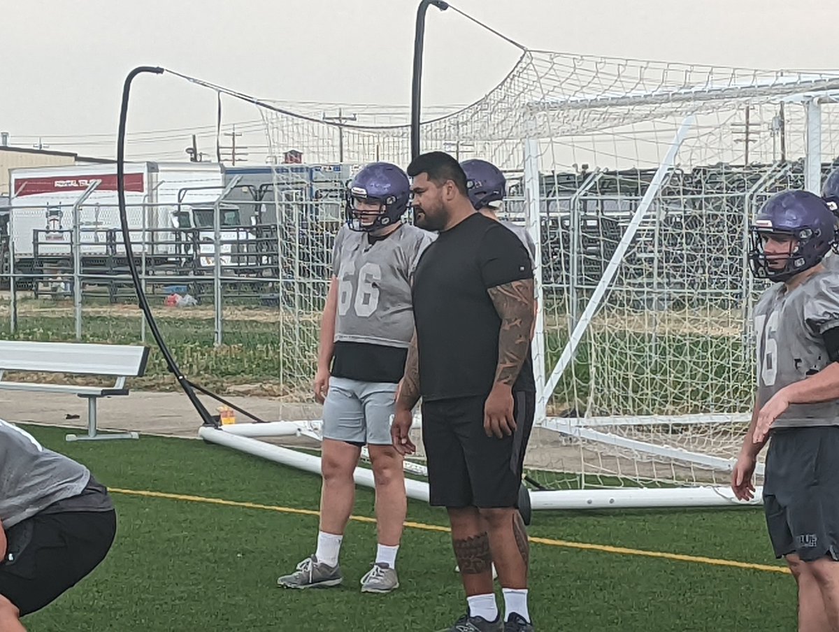 Four-time Pro-Bowler Mike Iupati gives instruction to the Yotes offensive line.