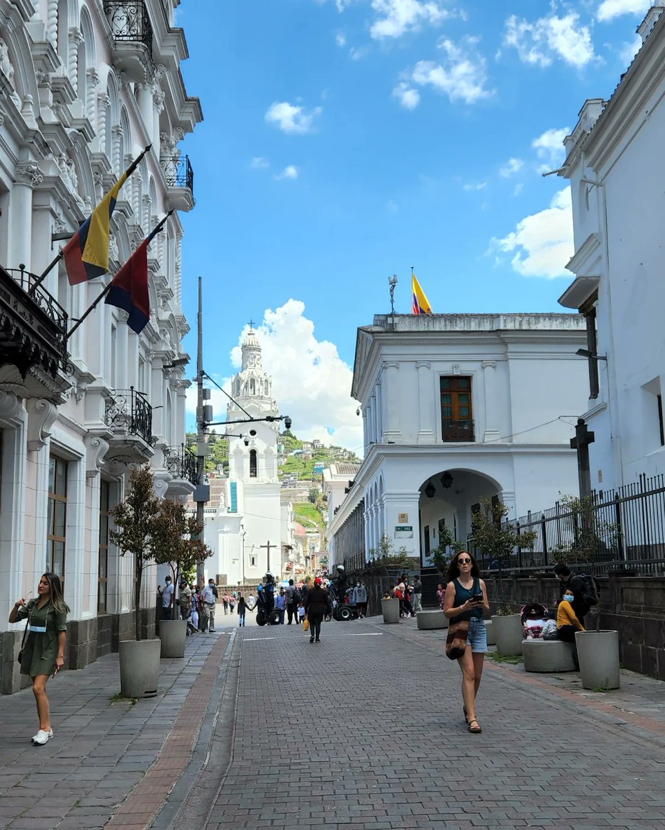 You are always high in Quito 9000ft! In the streets of Quito Ecuador. It is vibrant and filled with fun loving people! #travel #Ecuador #Quito