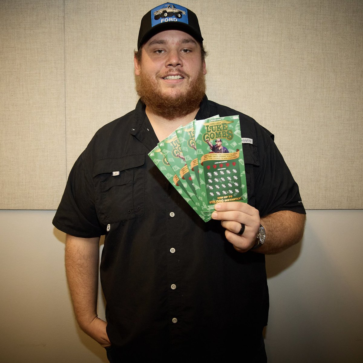 lukecombs's tweet photo. Then I won a hundred bucks on a scratch-off ticket...

Pumped to announce my own scratch-off! Fans across the USA will get a chance to win $500,000 at my exclusive concert at @theryman. 
#livingluckywithlukecombs

Participating states/details: https://t.co/ZubxIunUkM https://t.co/TaP4M1kCdU
