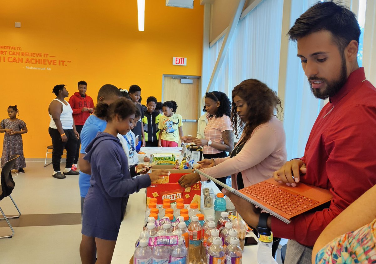 KCCreditUnion's tweet photo. Catch Success — review from the 'Walk Through Life' game. Kids who meet the goal of saving $300, will receive a backpack filled with school supplies! Glad that Beth Falkenstein from #HCUA could attend! #HCUFC. Thanks #Dunkin-Raytown, the @KansasCityYMCA and KCCU employees! https://t.co/HU6O0jVrC8