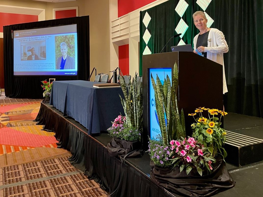 USDA_ARS's tweet photo. Live update, “Monitoring soil PH in blueberry production and use woody materials like sawdust as an amendment are key to maximizing yield. Blueberries are also terrible competitors with weeds” @OregonState Berry Authority Bernadine Strik, @berriesGood4U #MorrisonLecture #ASHS2022 https://t.co/EZo6YWrBuu