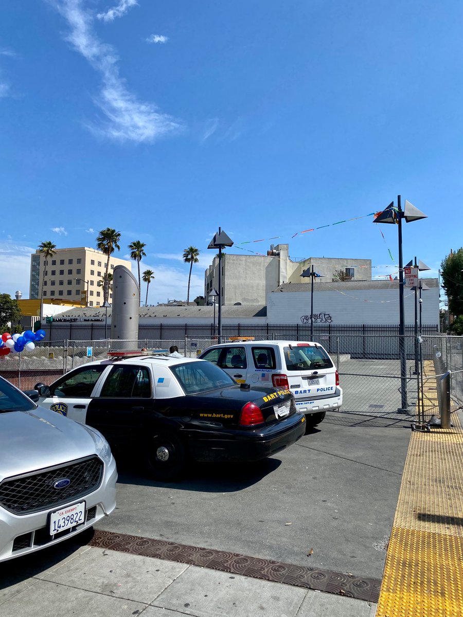 hdizz___'s tweet photo. SF closed off the 24th BART plaza to the public but are fine using the space for this dystopian “national night out” police state block party, super uncomfortable walking past like 20 armed cops to take a train https://t.co/JRlSoYK1Eb