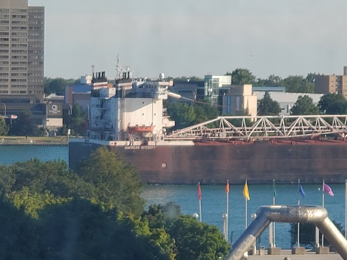 pjcolbeck's tweet photo. Sitting outside Wayne County Clerks office in Detroit awaiting review of election returns as freighters go by. Fittingly, check out the name of ship in photo. #AmericanIntegrity. It was headed South. @realLizUSA @LizHarrisMBA @WendyRogersAZ @MrJustinBarclay @BobDutko https://t.co/RxMFpBcNtq