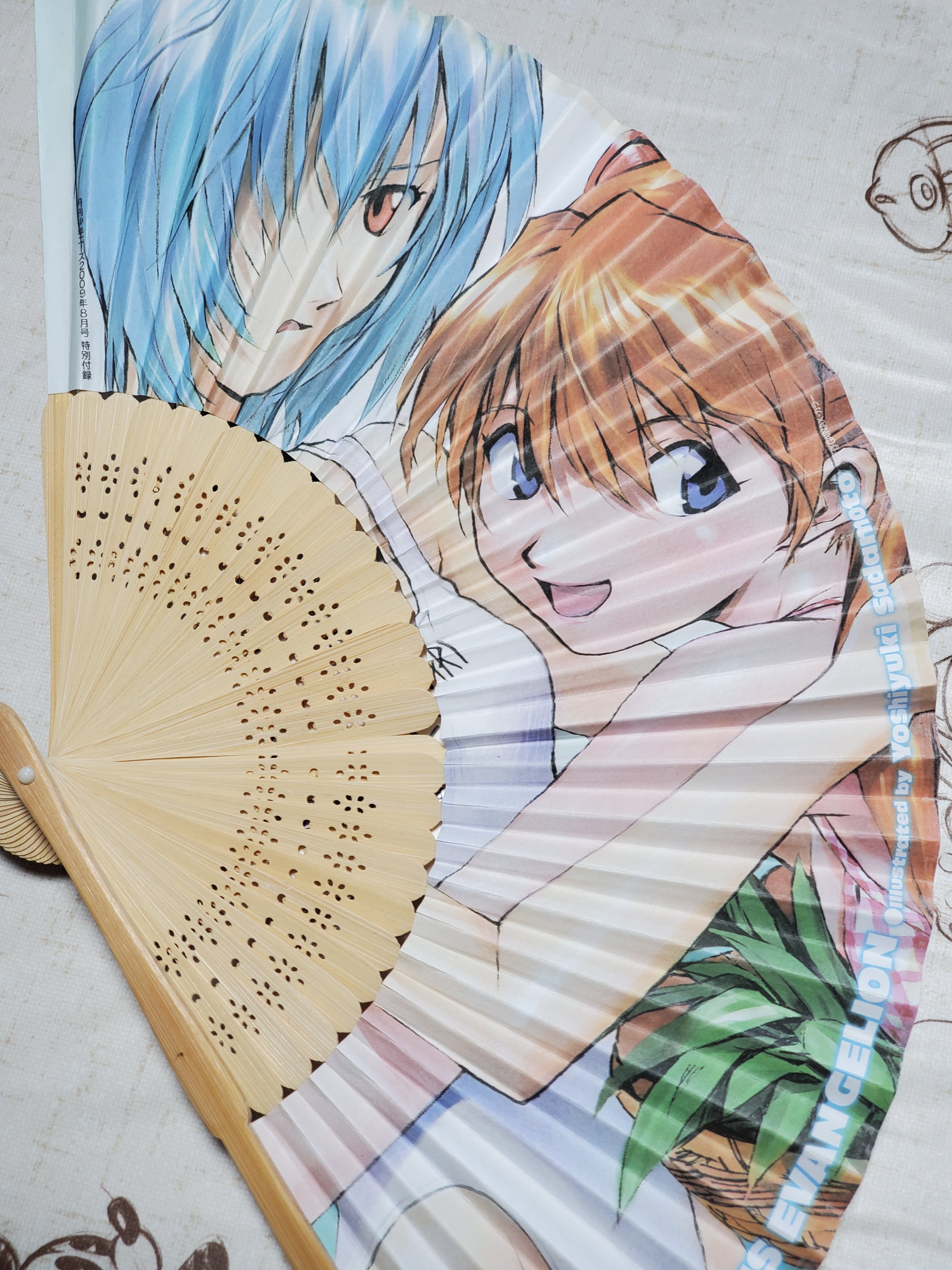 Kenn 実家で発掘されたエヴァ扇子 夏っぽくて良さげ 貞本義行さんイラストが好き 雑誌の付録だったみたい エヴァ Evangelion 貞本義行 T Co 6as6lwlx Twitter