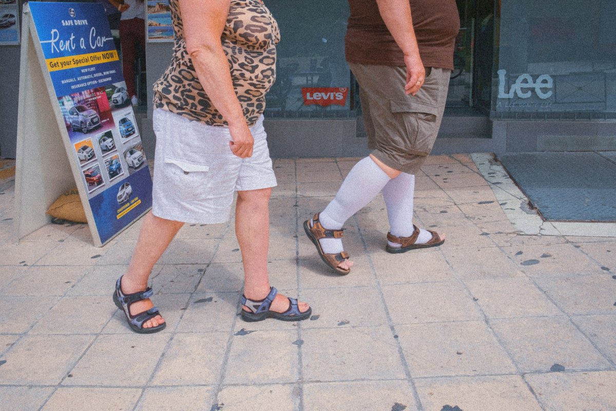 Gangelakis's tweet photo. "Τhe tourists" is a series of photos I have taken in my effort to document the human geography of tourism in  Crete.

#streetphotography #nftphotography #documentaryphotography https://t.co/liWz66ycKm