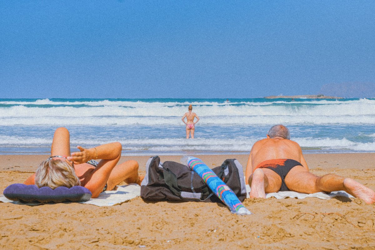 Gangelakis's tweet photo. "Τhe tourists" is a series of photos I have taken in my effort to document the human geography of tourism in  Crete.

#streetphotography #nftphotography #documentaryphotography https://t.co/liWz66ycKm