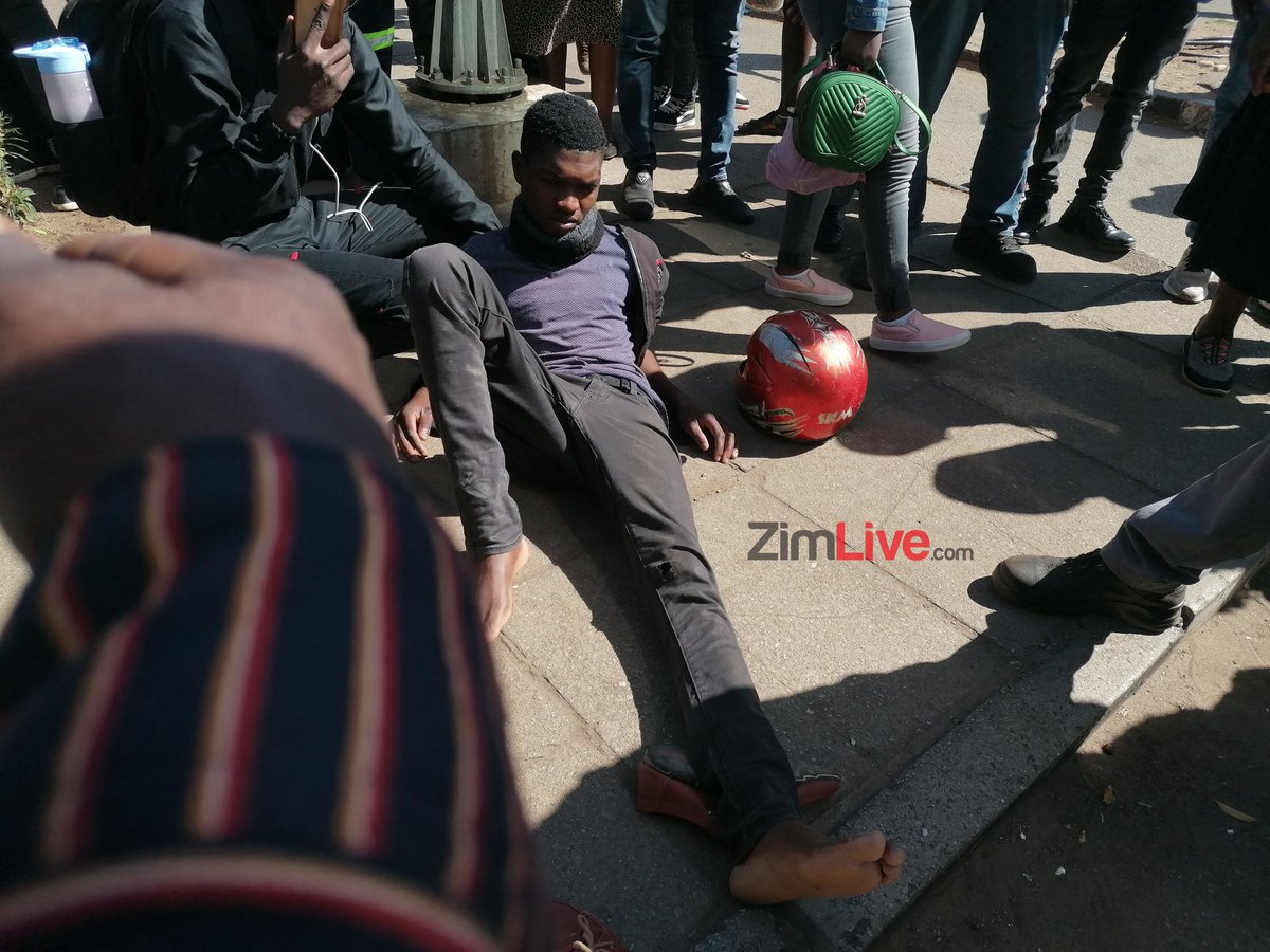 zimlive's tweet photo. 🚨HIT AND RUN: A speeding white Honda Fit pirate taxi driver fled moments ago after hitting a motorcycle at Julius Nyerere &amp; Jason Moyo (Joina City Mall) traffic lights. The biker Tichaona Matomu survived injuries and says he's employed by Brisk Logistics Company. https://t.co/AZuWRlC5so