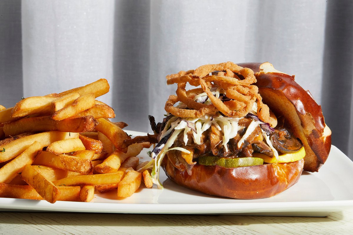 moneymusclebbq's tweet photo. Vegan? Take a bite out of our smoked mushroom sandwich packed with cremini, shiitake, and oyster mushrooms. 

With pickles, coleslaw, crispy fried shallots and North Carolina BBQ sauce, meat lovers are going to want to sink their teeth into this one too! 

📸: @deblindsey https://t.co/LyQixDTdOw