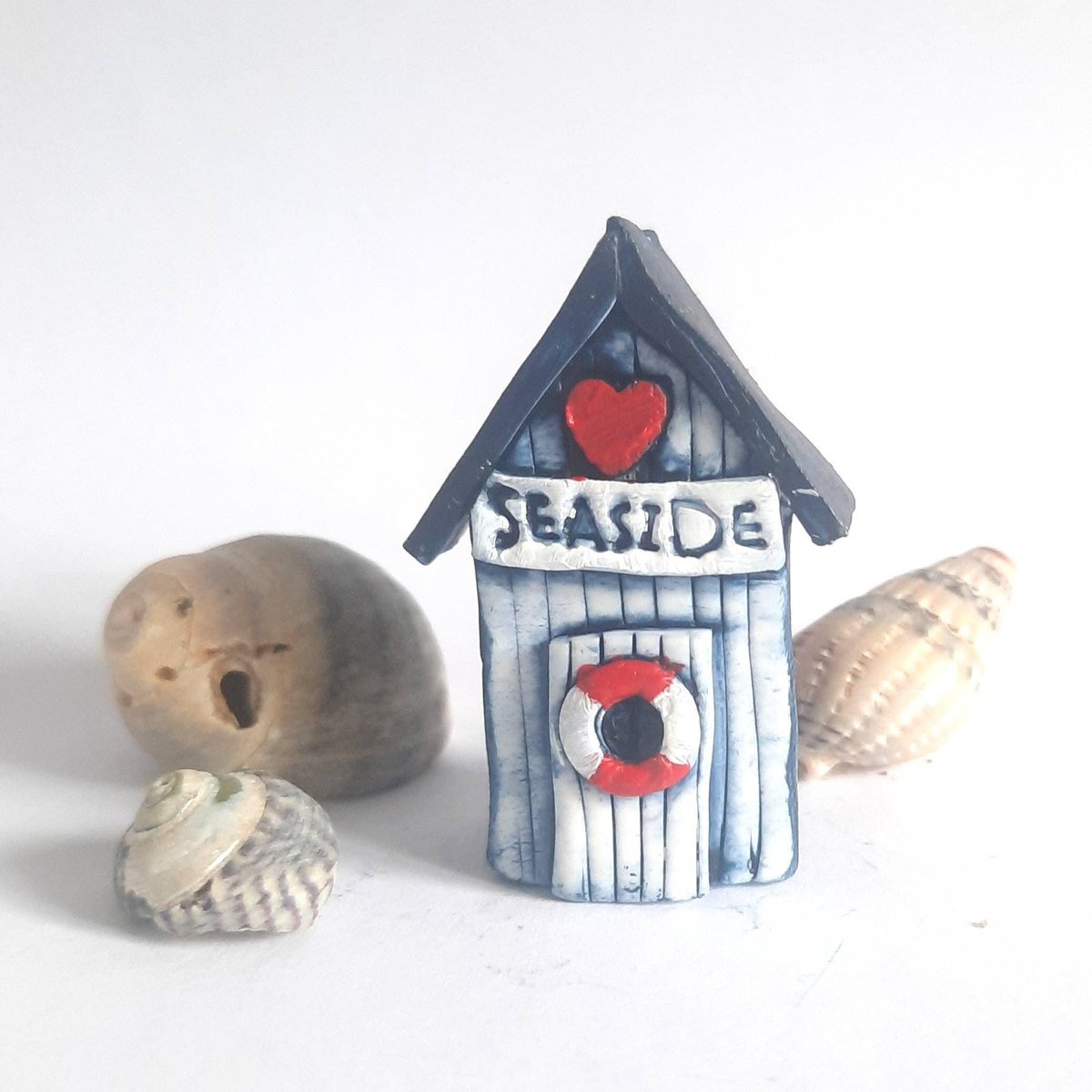HareWhimsy's tweet photo. Excited to share the latest addition to my #etsy shop: Miniature beach hut of love with tiny heart &amp; bunting motif. a super cute token to say 'I Love You' ❤️ 
#coastaltropical #beachhutgift #engagementgift #etsyuk #etsyfinds #postalweddinggift @Etsy https://t.co/1uMXOb6rd9 https://t.co/lRJ2AWrhbO