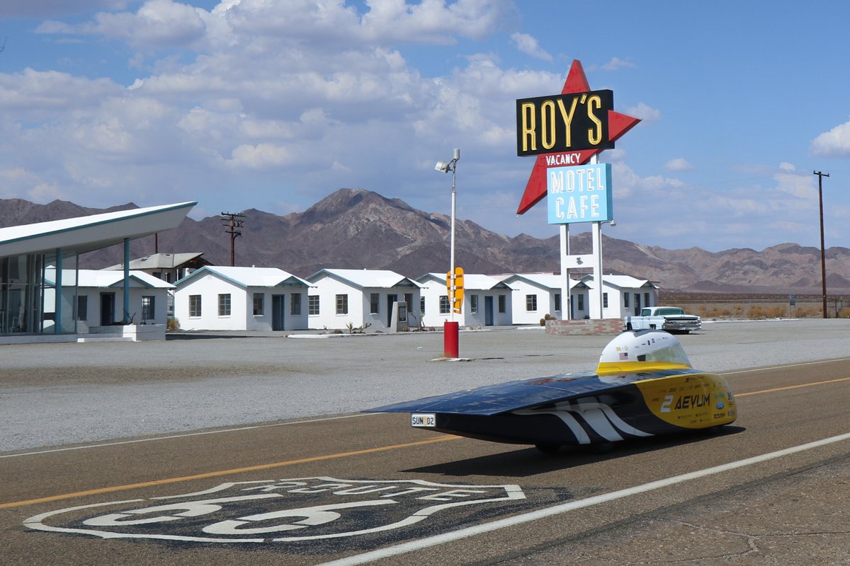 UMSolarCarTeam's tweet photo. At 108 degrees F, the Mojave Desert presented the hottest challenge for Aevum. After the team stopped at Roy's Motel &amp; Café to recharge, we rerouted down Route 66 and onto I-40 West due to construction. Now, the end is within sight. Los Angeles, here we come!

#MichiganSunRun https://t.co/wfinJdBNeF